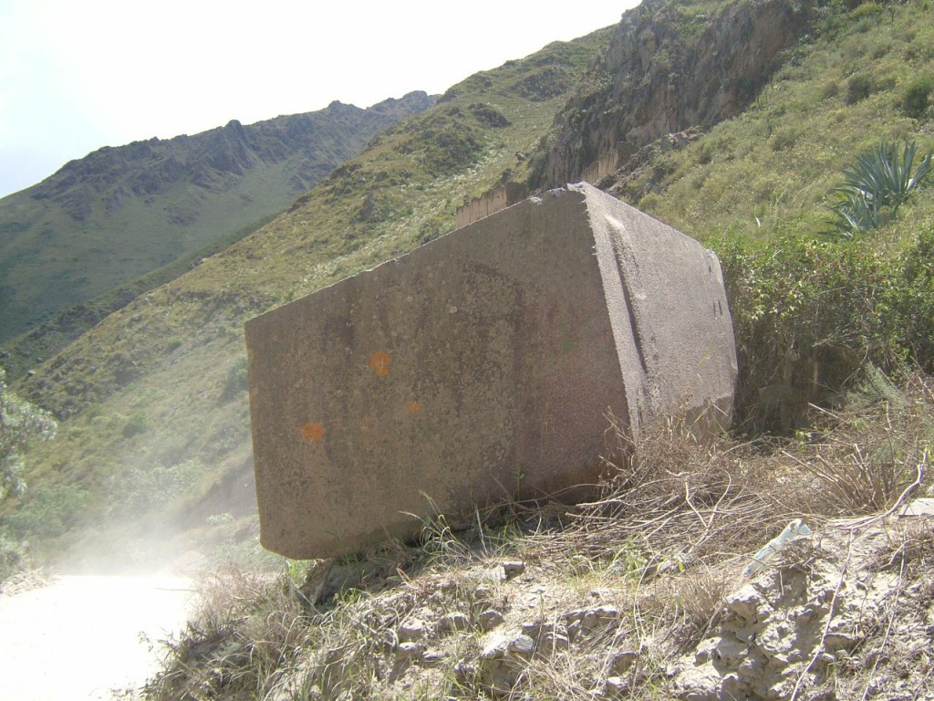 One of several massive blocks of rhyolite that were apparently left abandoned in the Sacred Valley between the quarry and the Temple of the Sun, at Ollantaytambo.
